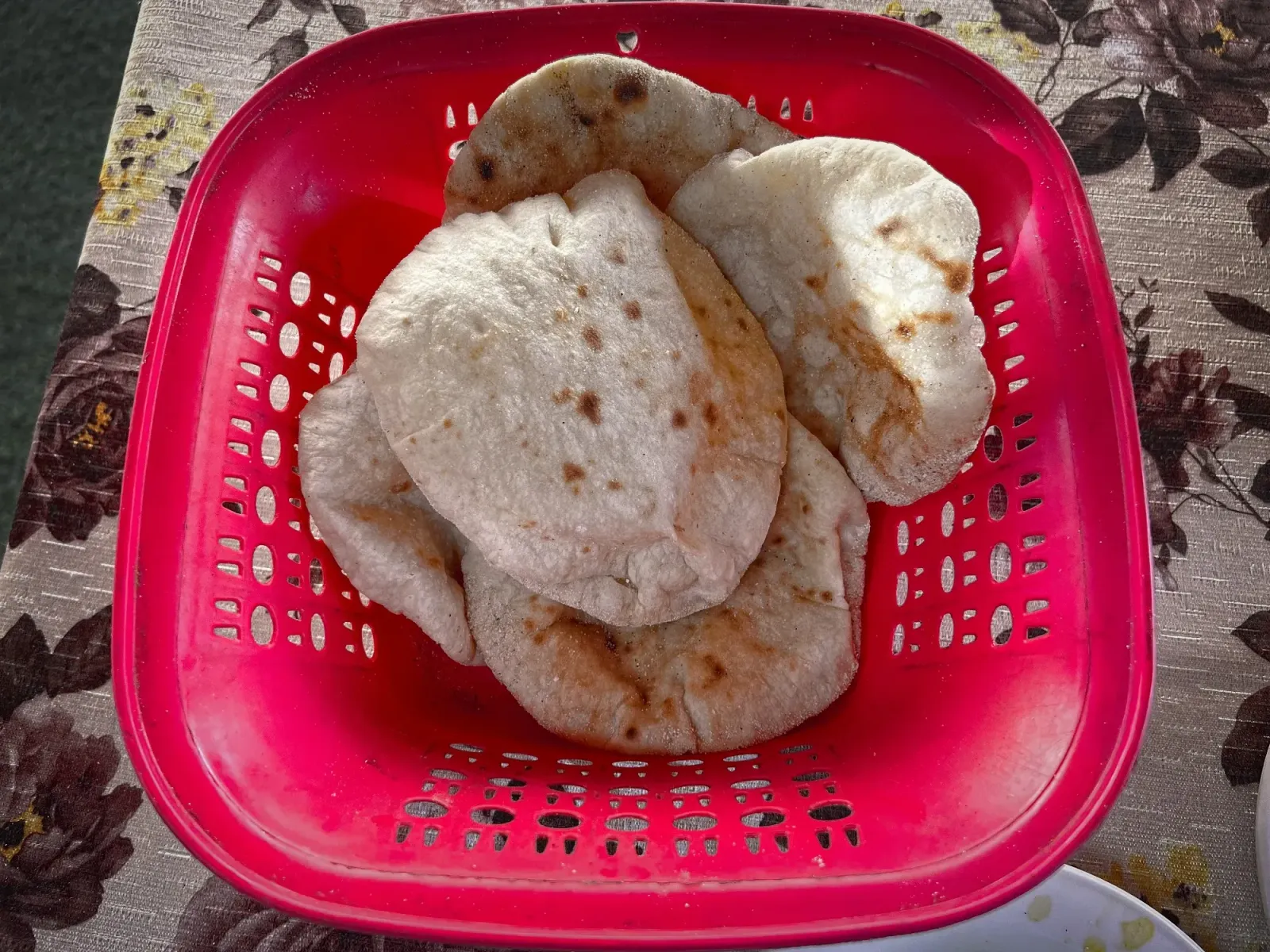 Aish Baladi by Mr. Wanderer Basket of Aish Baladi, overhead shot.