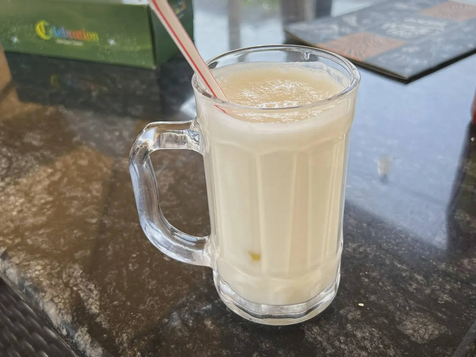 Laban Drink by Mr. Wanderer Laban in a glass mug with a stray, angled shot.