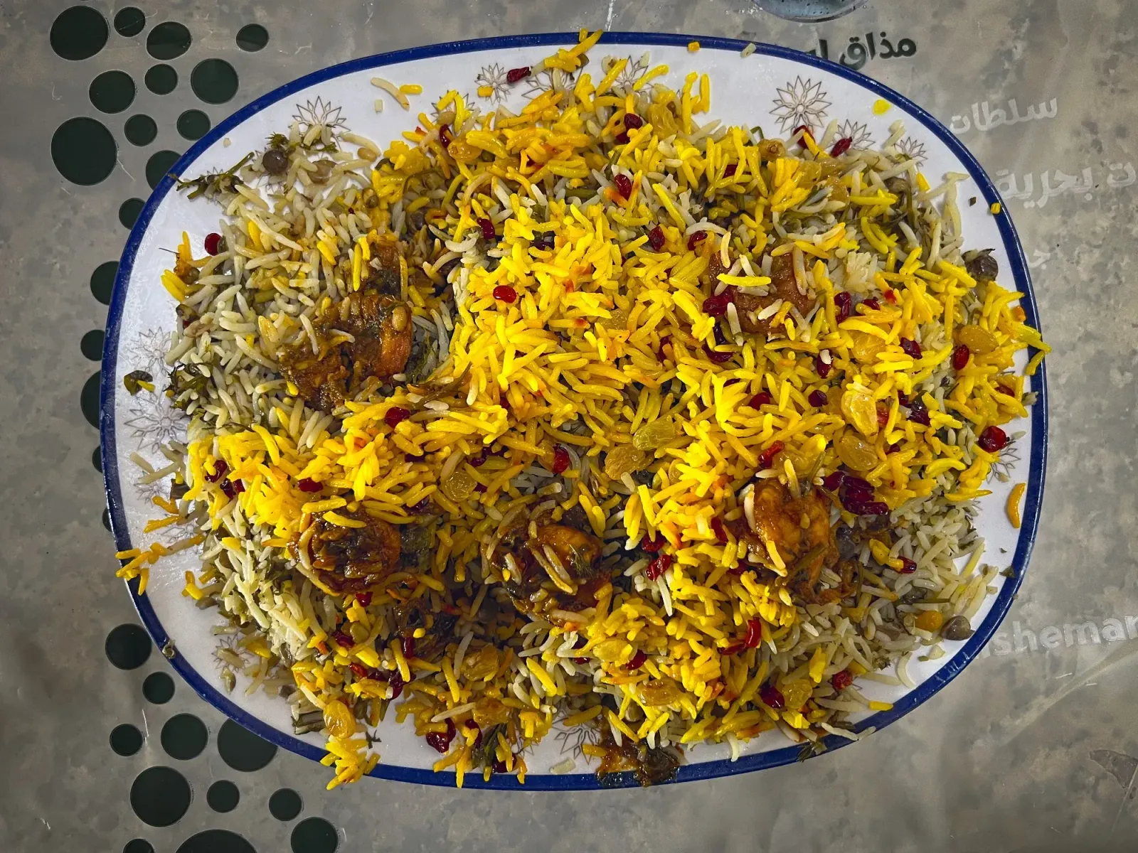 Murabyan by Mr. Wanderer Large serving plate of Murabyan, overhead shot.