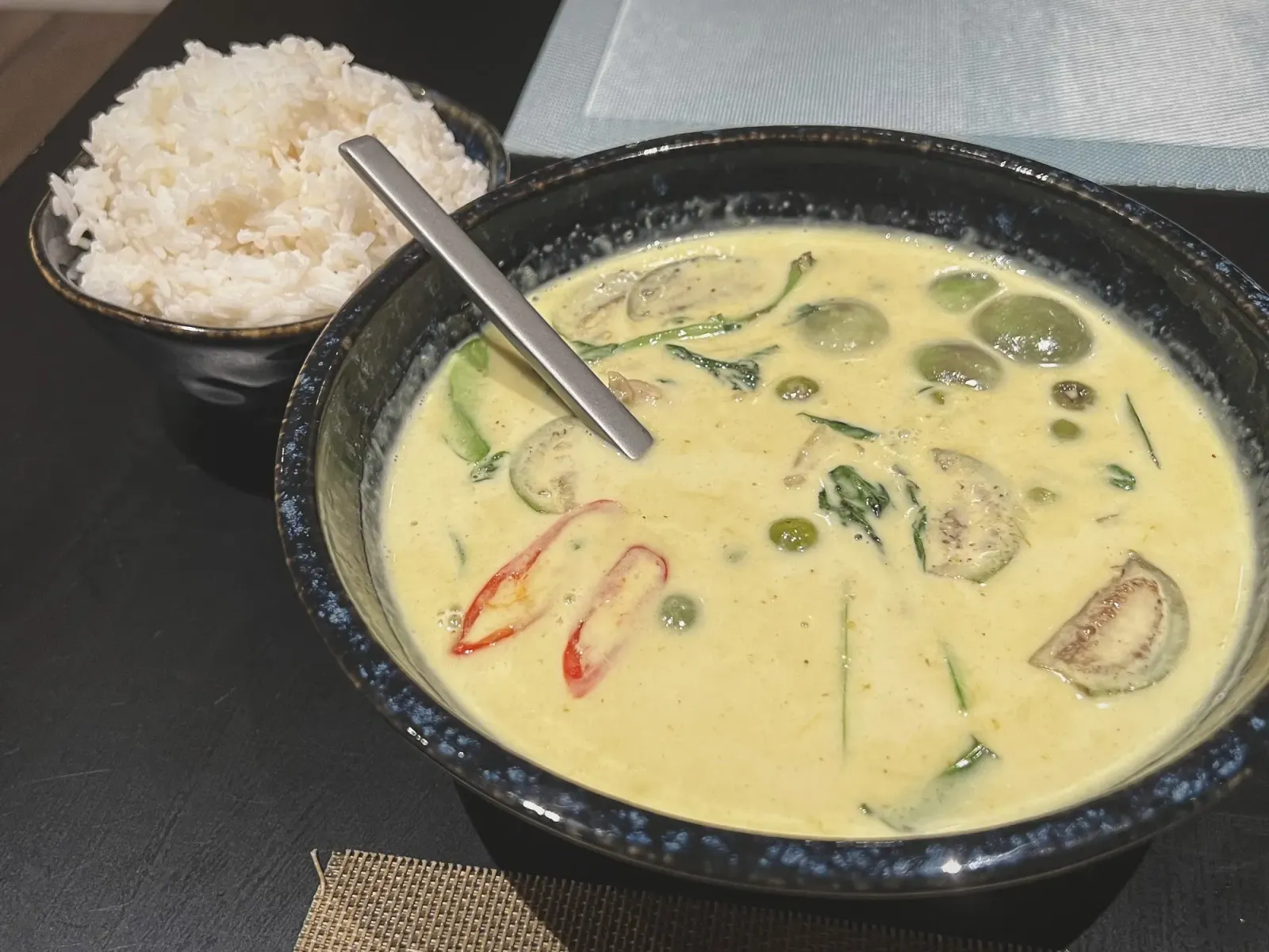 Green Curry by Mr. Wanderer Green Curry with rice in the background.