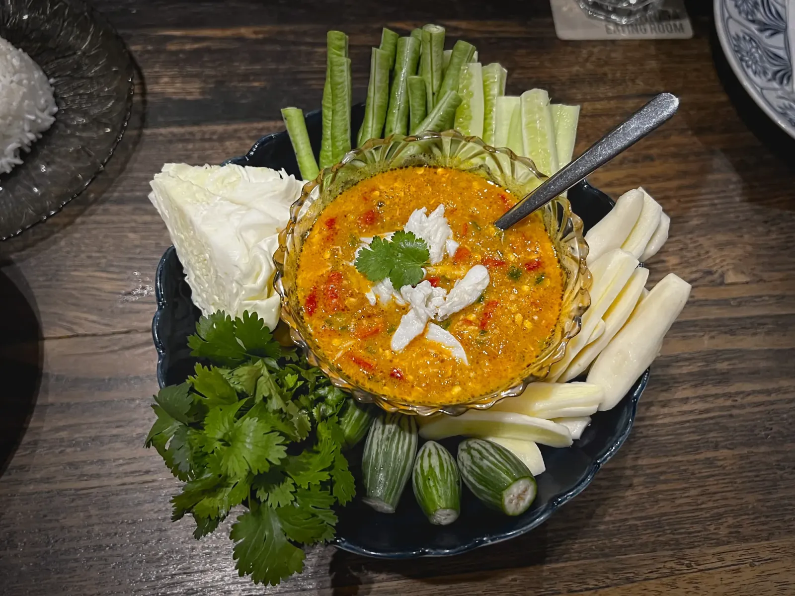 Nam Prik Khai Pu by Mr. Wanderer Nam Prik Khai Pu surrounded by all the vegetables for dipping, overhead shot.