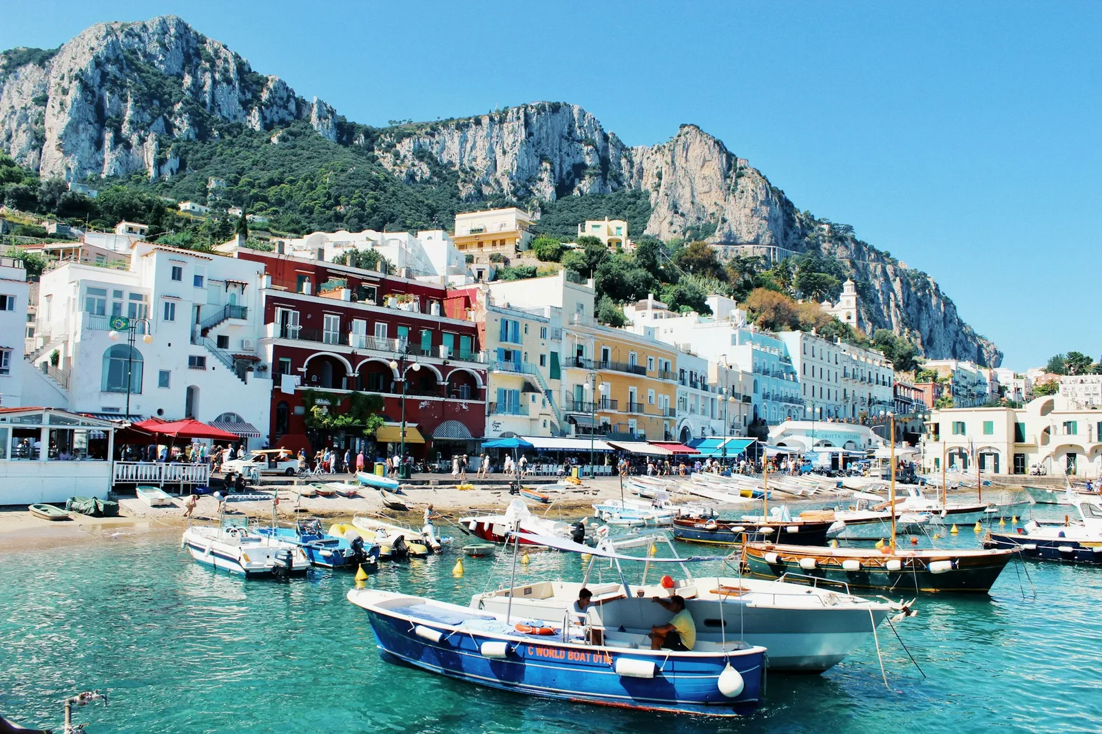 Photo by Ellena McGuinness / Unsplash Pulling into the harbour at Capri. Bold colours of turquoise seas and contrasting boats and buildings galore.