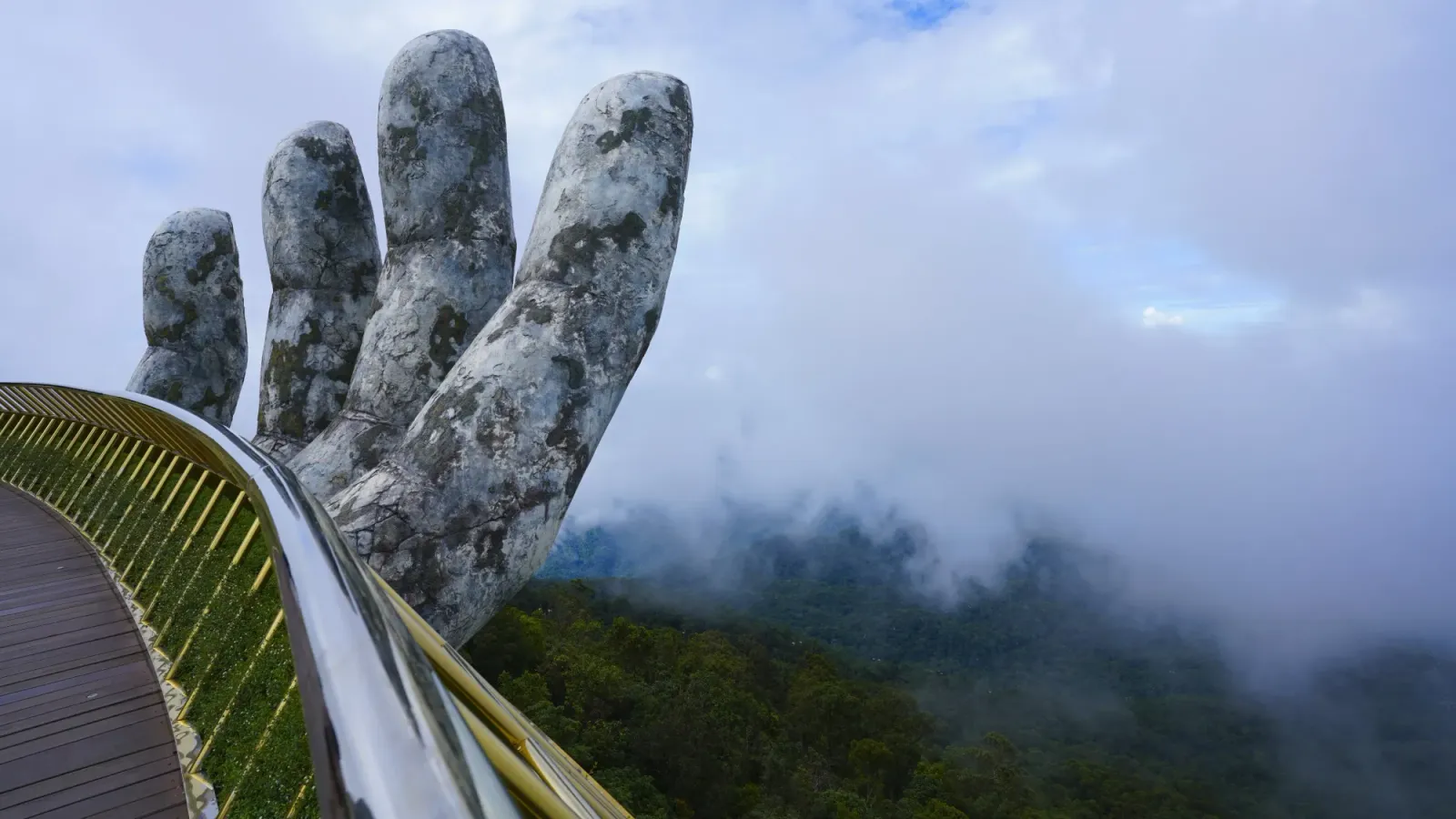Ba Na Hills by Ms. Wanderer Golden Bridge Hand shot over the valley