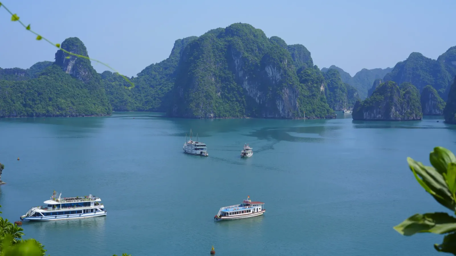Ha Long Bay Boats by Mr. Wanderer Ha Long Bay islands and boats shot from the top of an island