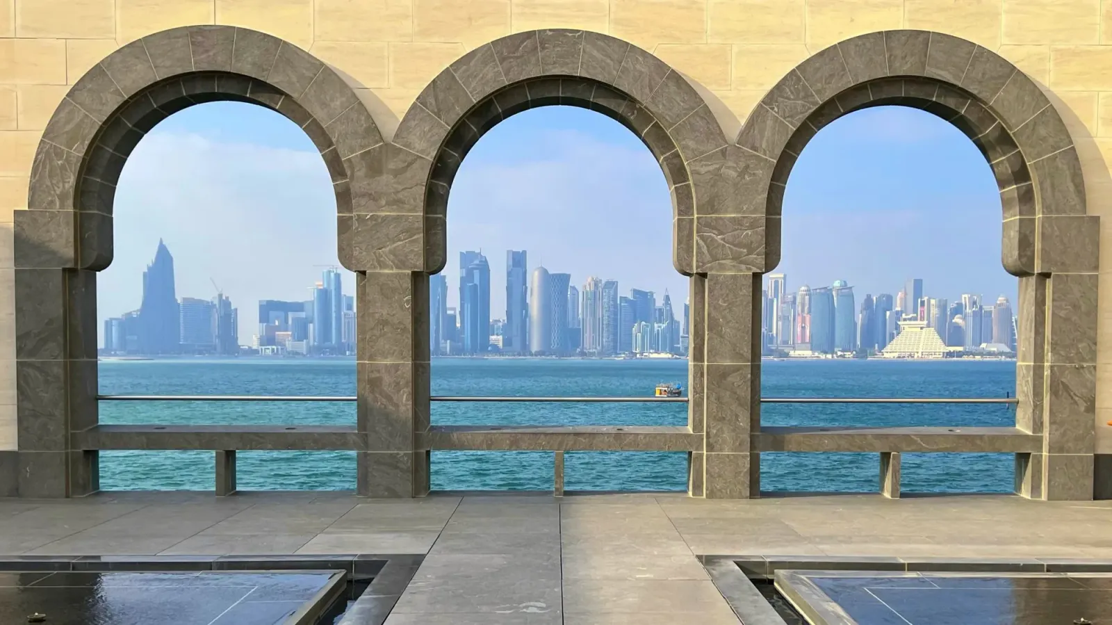 Museum of Islamic Art by Mr. Wanderer Three arches through which you can see downtown Doha
