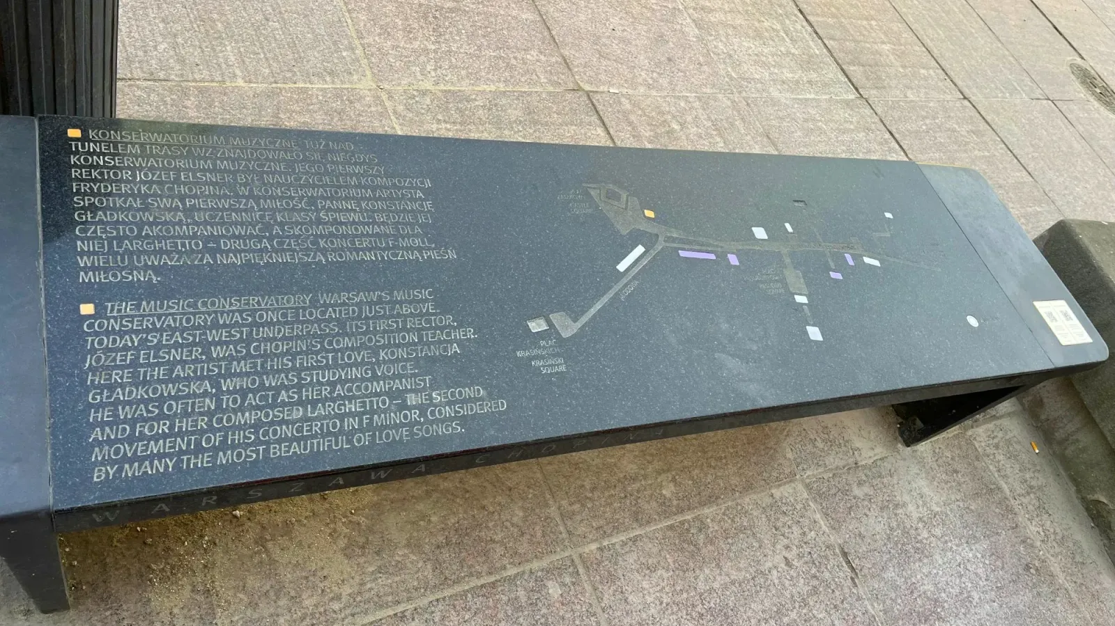 Chopin Bench by Mrs. Wanderer Black bench with a map of other bench locations on it