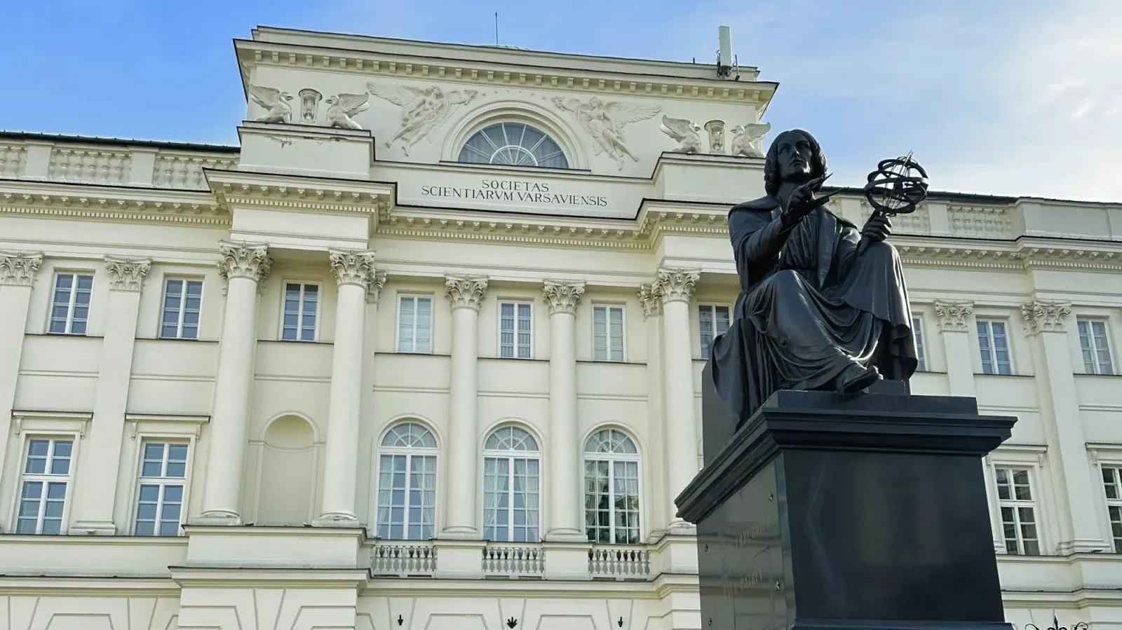 Copernicus Statue by Mr. Wanderer Black statue of Copernicus in front of the building for the Science Society of Warsaw