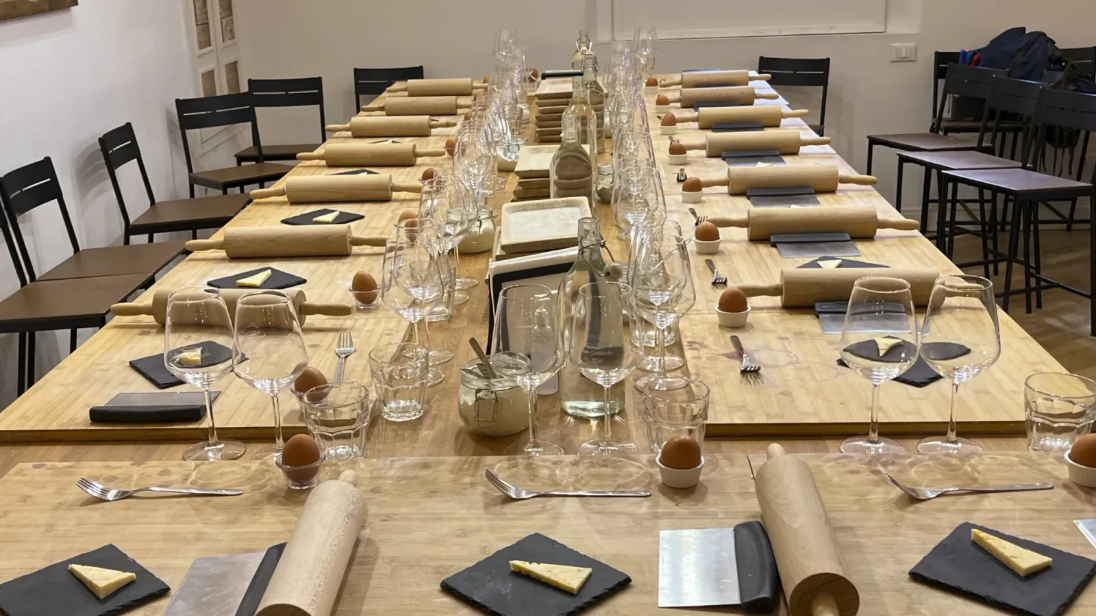 Pasta making by Mrs. Wanderer Table set for a pasta making class.