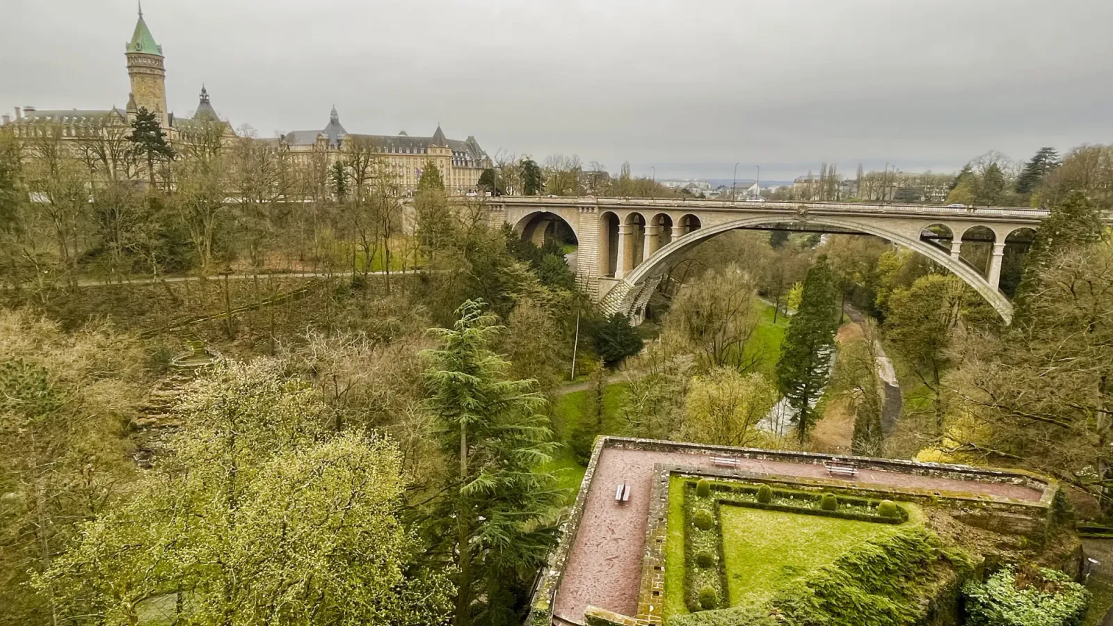Luxembourg Vista by Mrs.Wanderer Overview of the bridge and green space in Luxembourg City