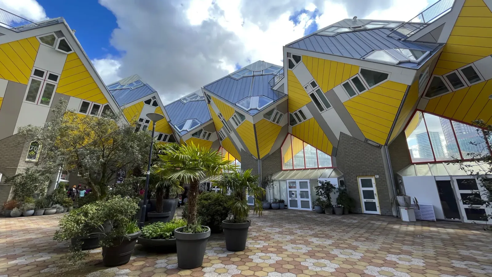 Cube House by Mr.Wanderer Yellow residential cubes with grey windows