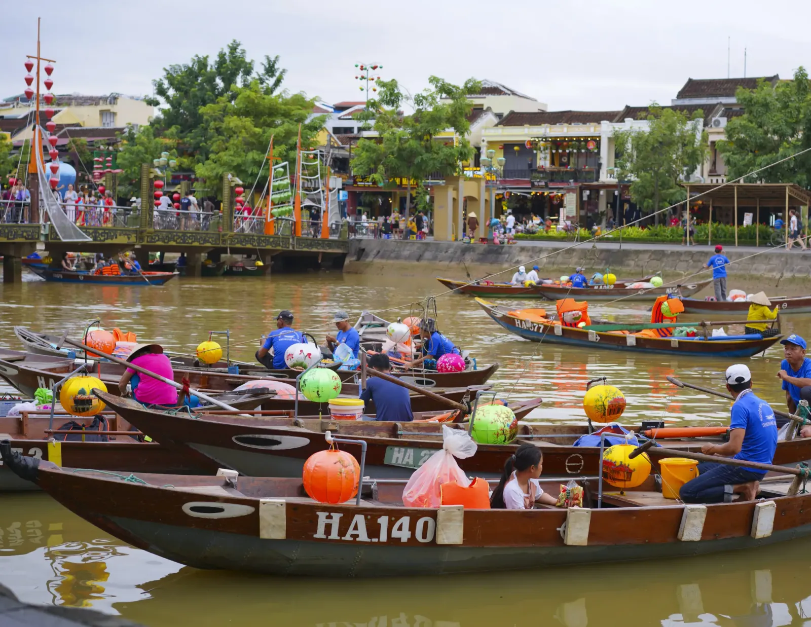 Hoi An Canals by Mr. Wanderer Long boats decorated with round colorful paper lanterns