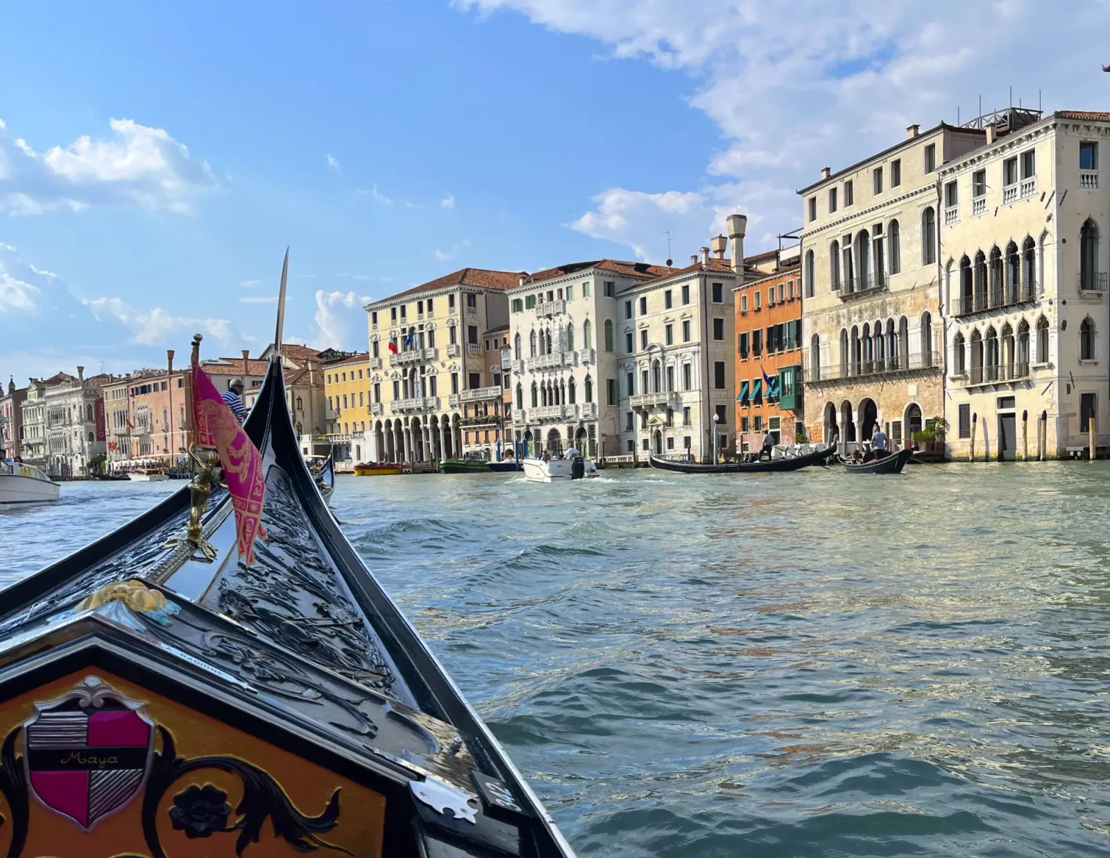 Gondola Ride by Mrs. Wanderer Tip of a gondola with a Venetian flag flying