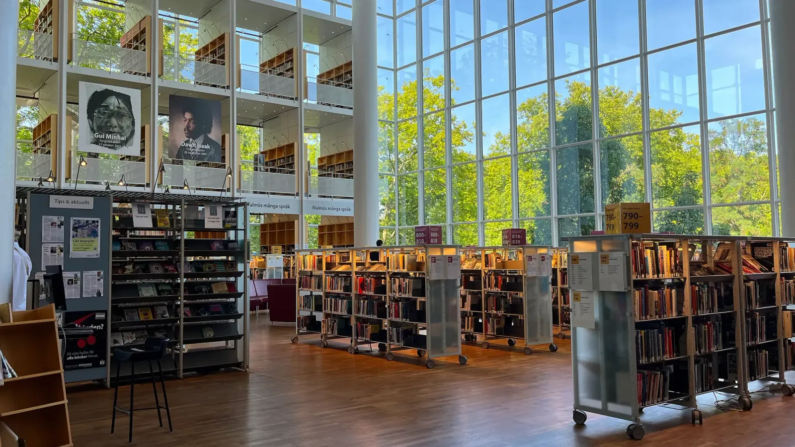 Malmö Library by Mrs. Wanderer Two glass walls with rows of bookshelves
