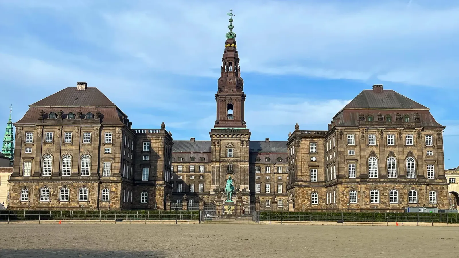 Brick governement building with copper statues