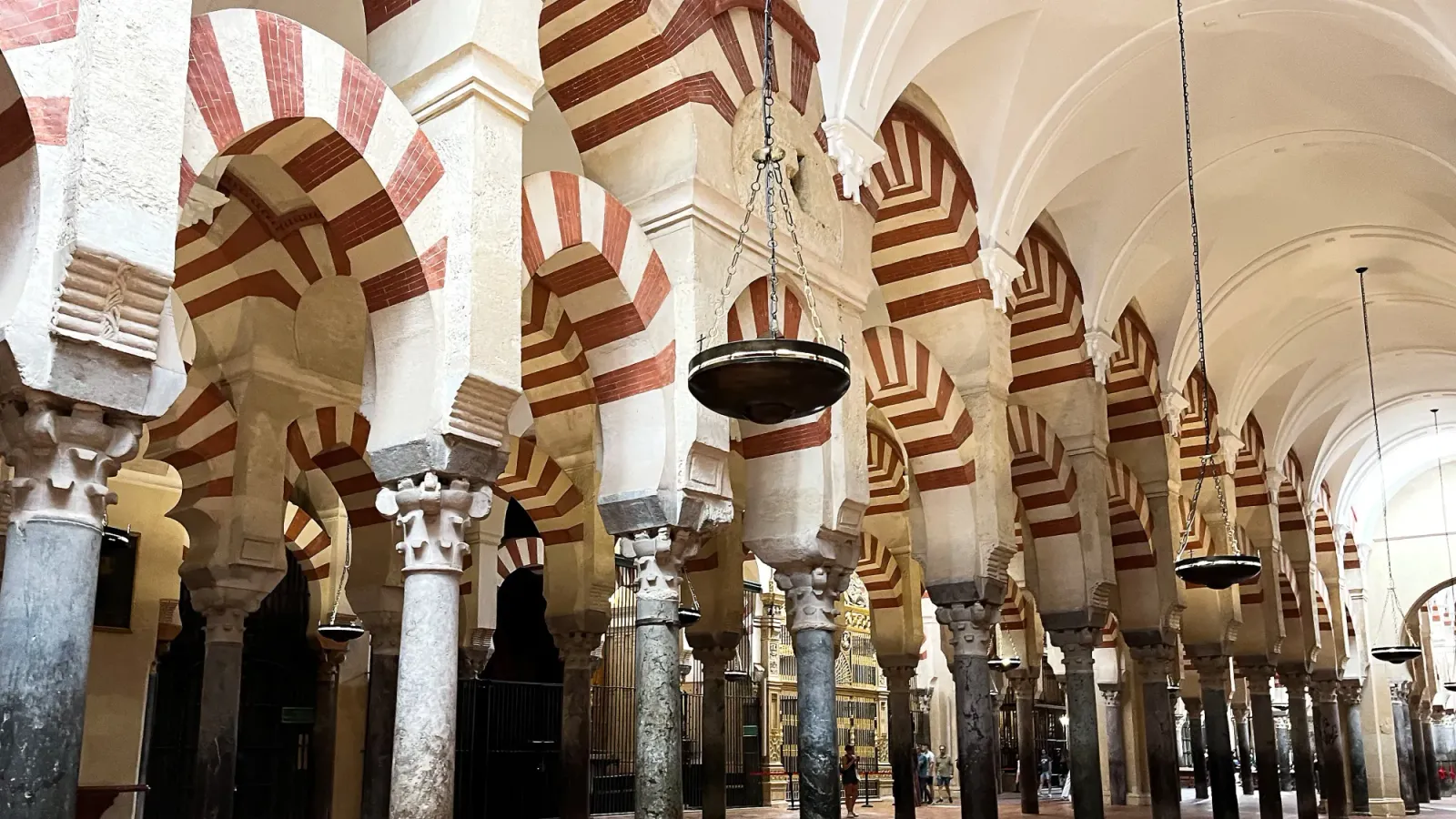 Mezquita-Catedral de Córdoba by Mrs. Wanderer Red and white striped archways