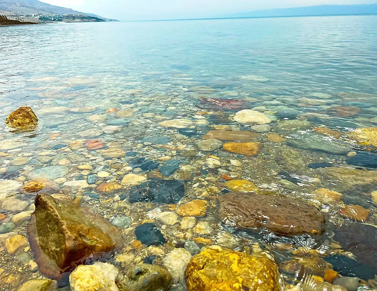 The Dead Sea by Mrs. Wanderer Colorful rocks under colorless water