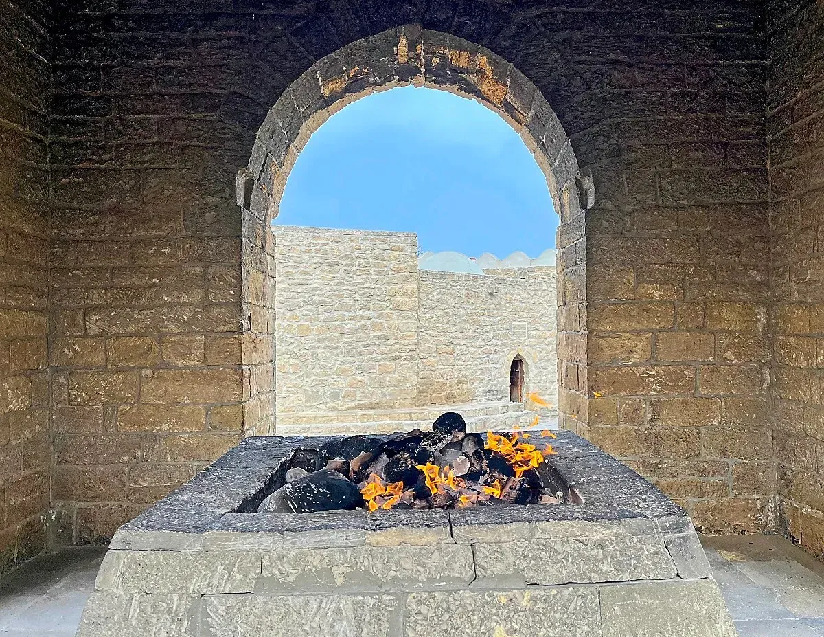 Ateshgah Eternal Flame by Mr. Wanderer Stone temple with a fire burning in the center