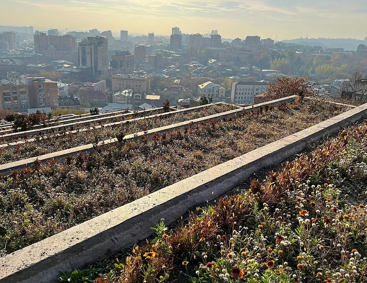 Cascade Complex by Mr. Wanderer Flower beds along the cascading marble steps overlooking the skyline of Yerevan