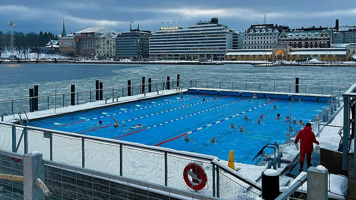 Helsinki Sauna by Mr. Wanderer Outdoor pool set above an ice-covered bay