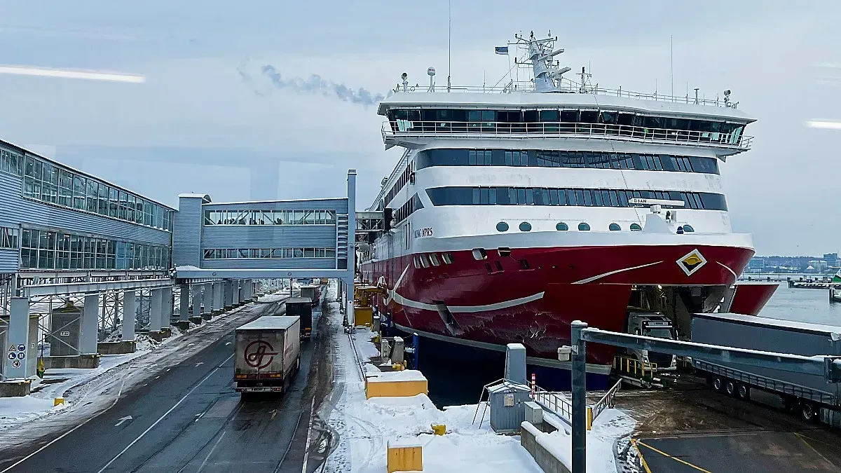 Baltic Sea Ferry by Mr. Wanderer Red and white ferry with metal boarding ramp