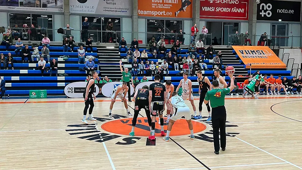 Estonian Basketball by Mr. Wanderer Two adult mens basketball teams on the court for tip-off
