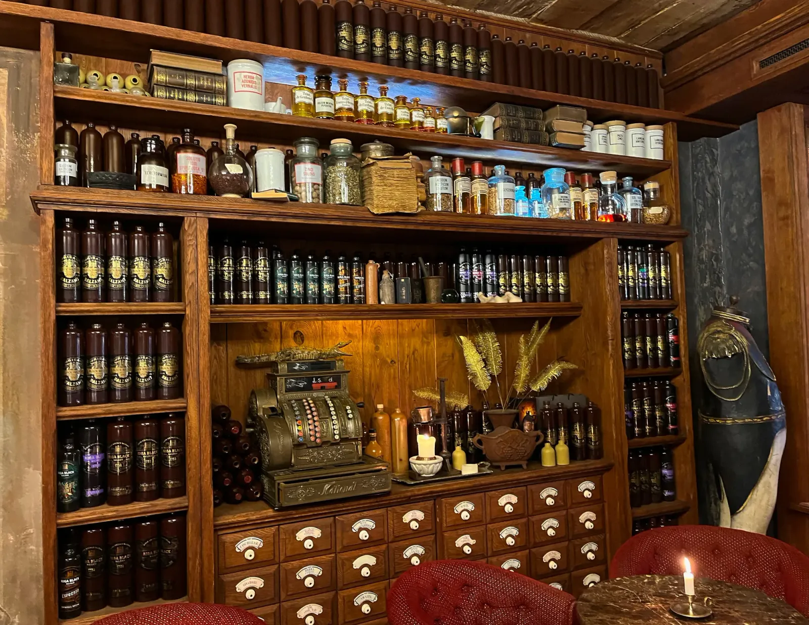 Black Magic by Mr. Wanderer Wooden apothecary cabinet with black balsam bottles and tinctures
