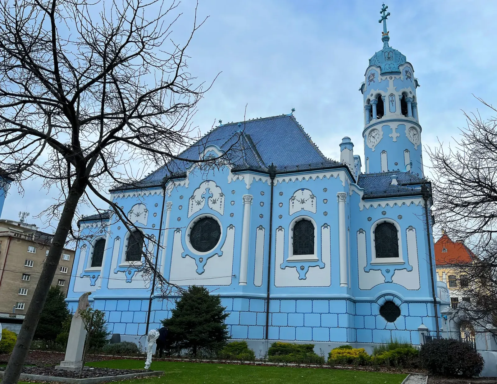 Blue Church by Mr. Wanderer Blue stone, paint, and tiled church
