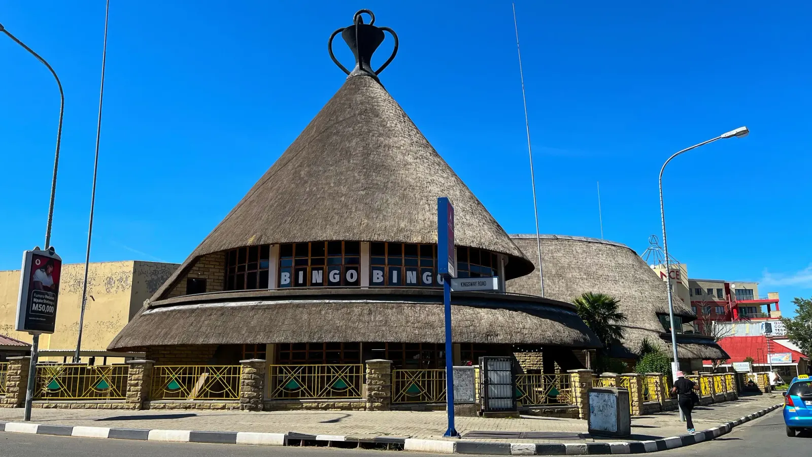 Mokolotro Building by Mrs. Wanderer Grass roofed building in the conical shaped classic Basotho hat.