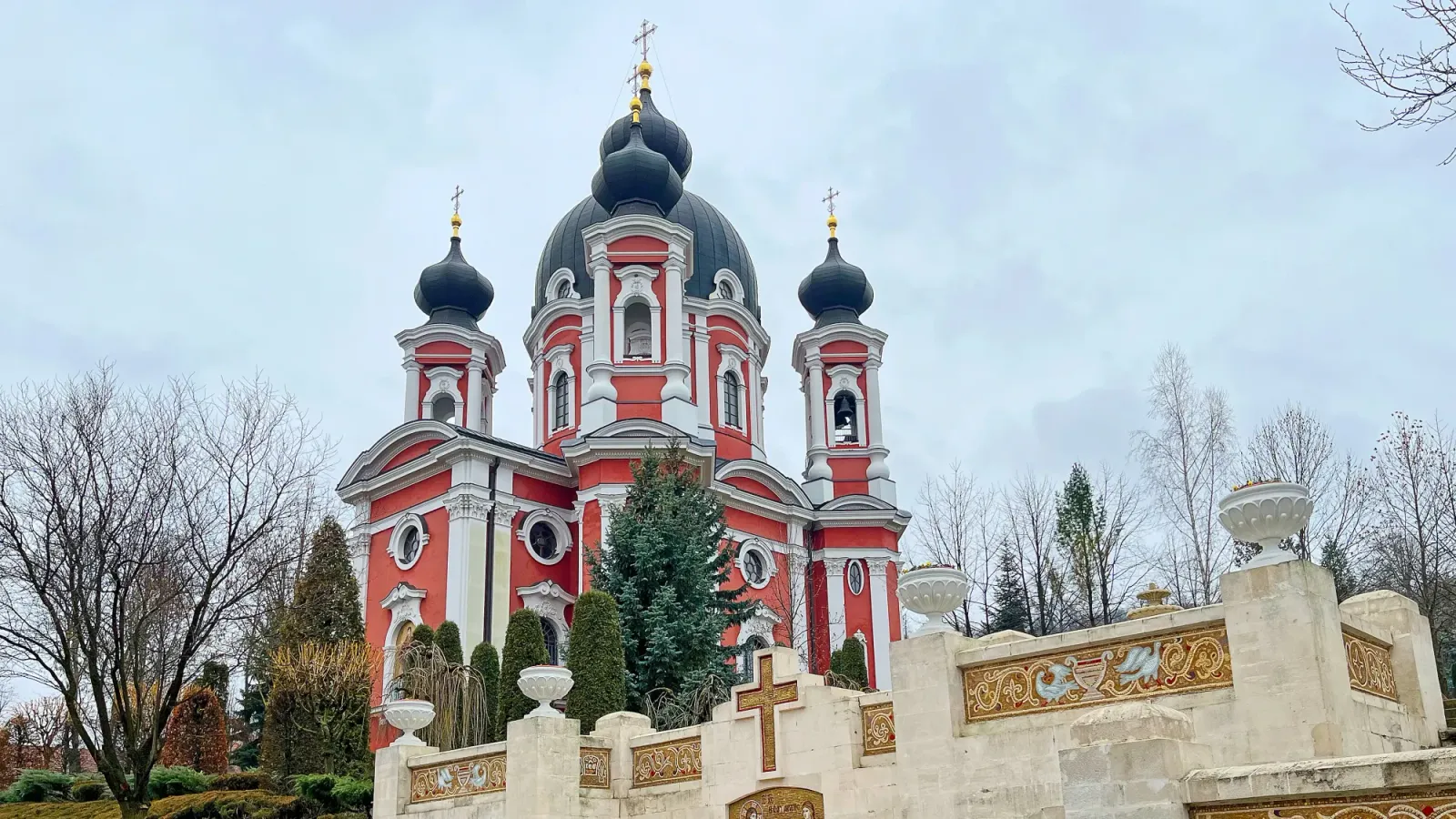 Mănăstirea Curchi by Mr. Wanderer Pink domed church photographed angling up towards the sky