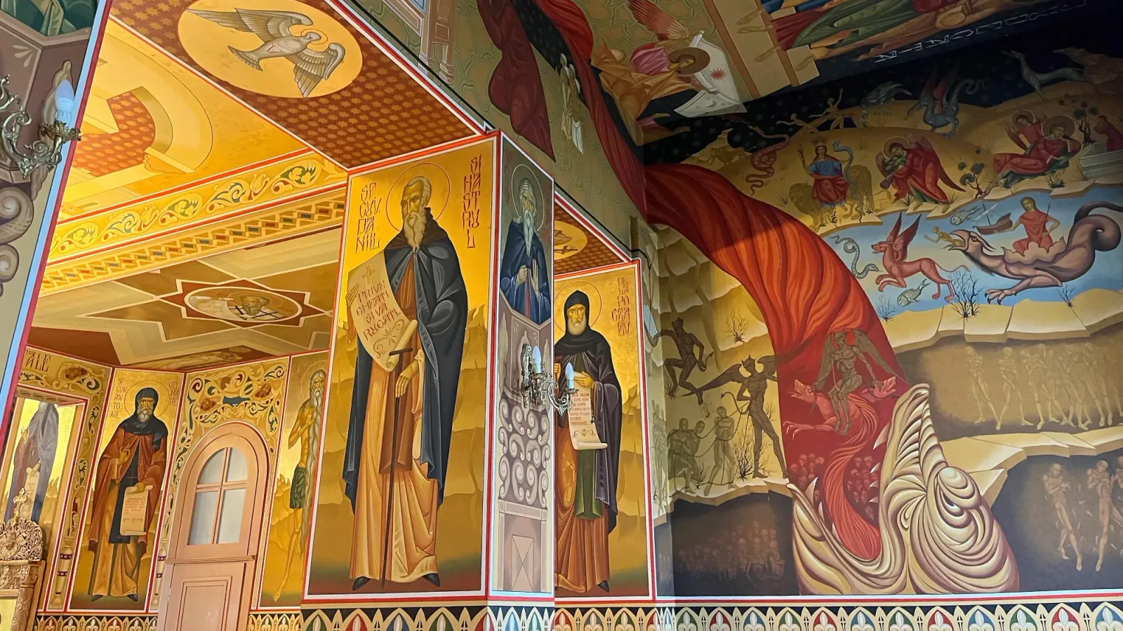 Mănăstirea Curchi Frescos by Mrs. Wanderer Vibrant wall paintings of orthodox saints and biblical stories on the walls
