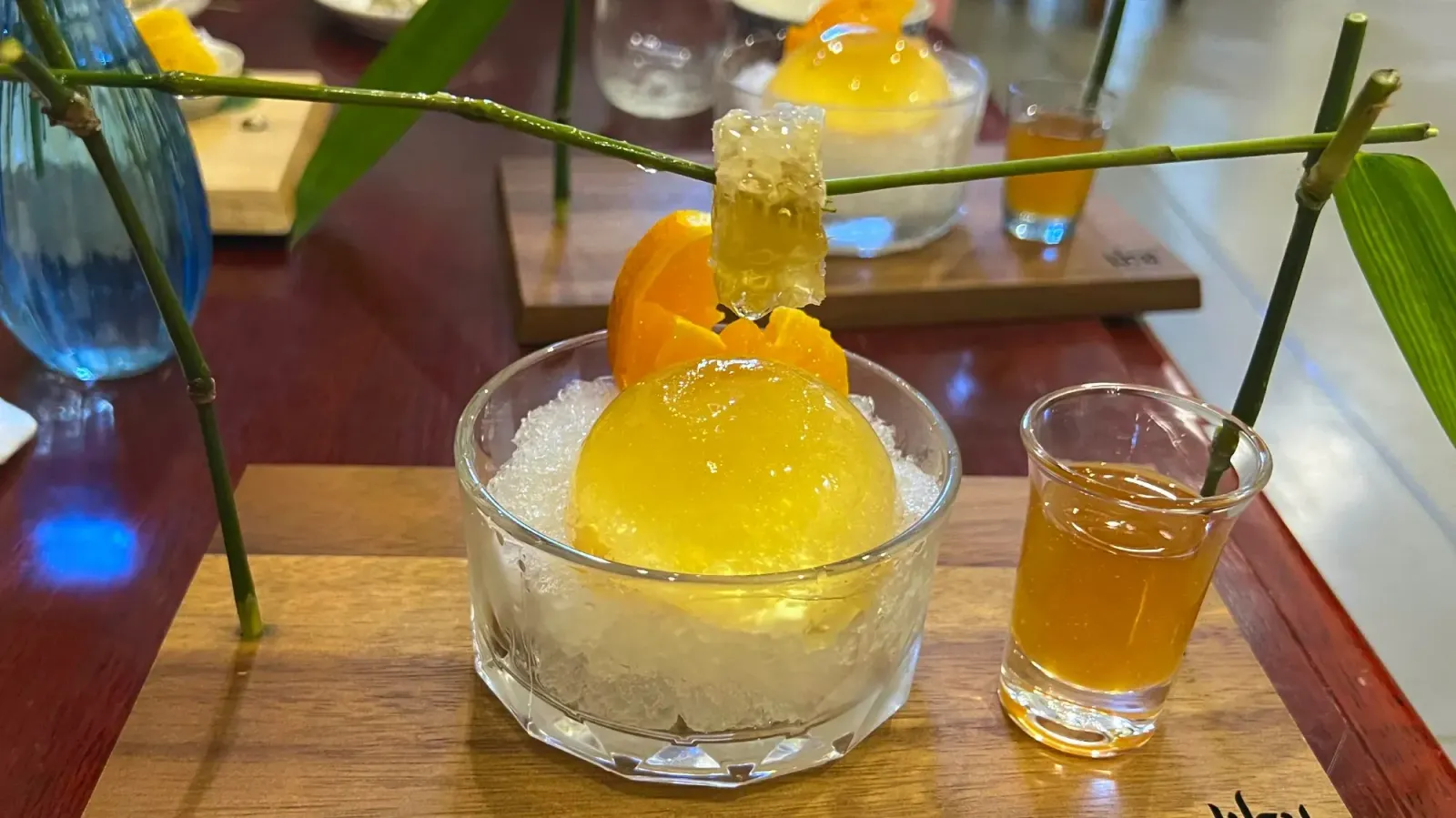 O-aew by Mr. Wanderer Close up image of gelatinous dessert with honey comb