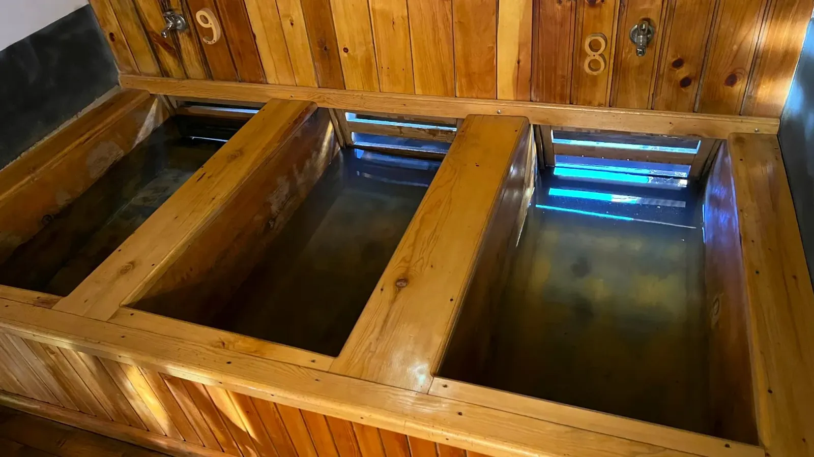 Hot Stone Bath by Mr. Wanderer Three wooden bathtubs